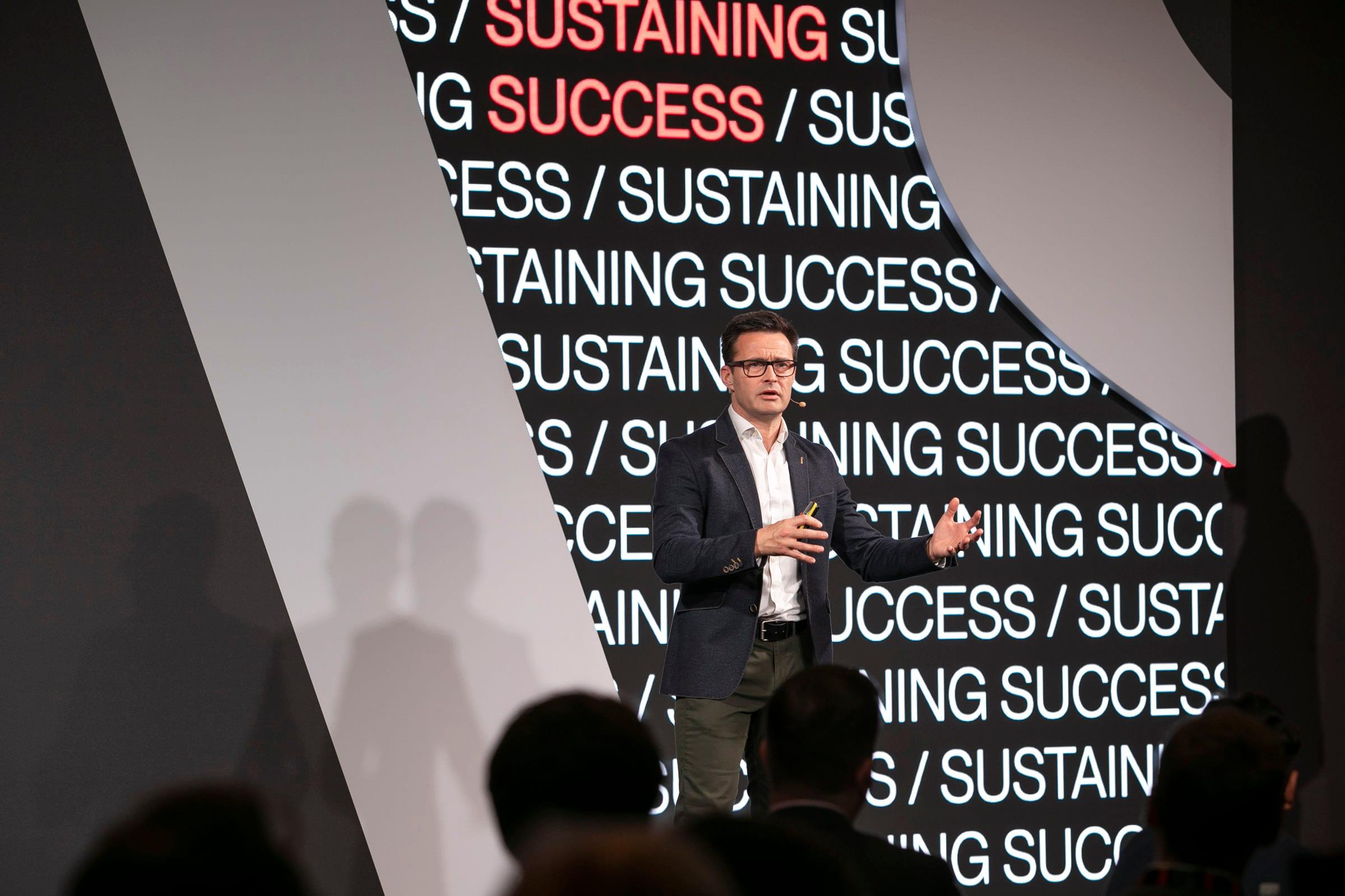 Dr Steve Ingham delivering a keynote on stage