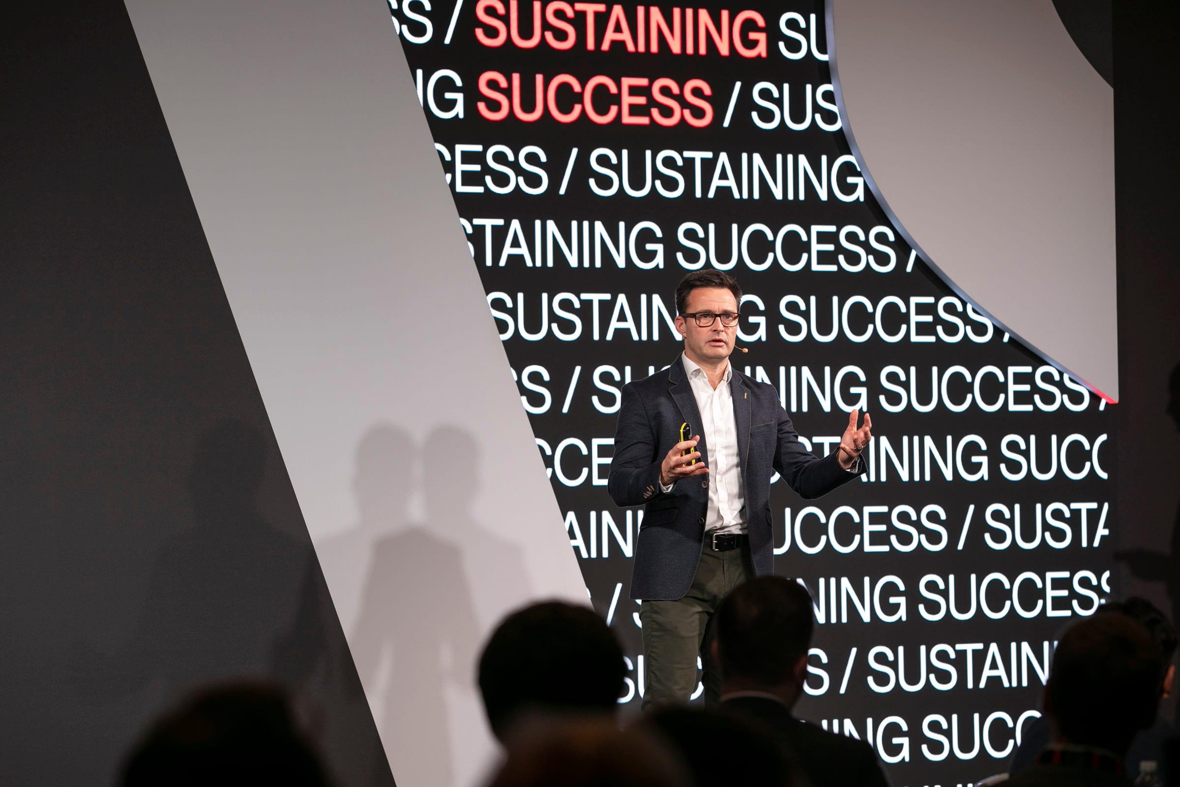 Dr Steve Ingham delivering a keynote on stage
